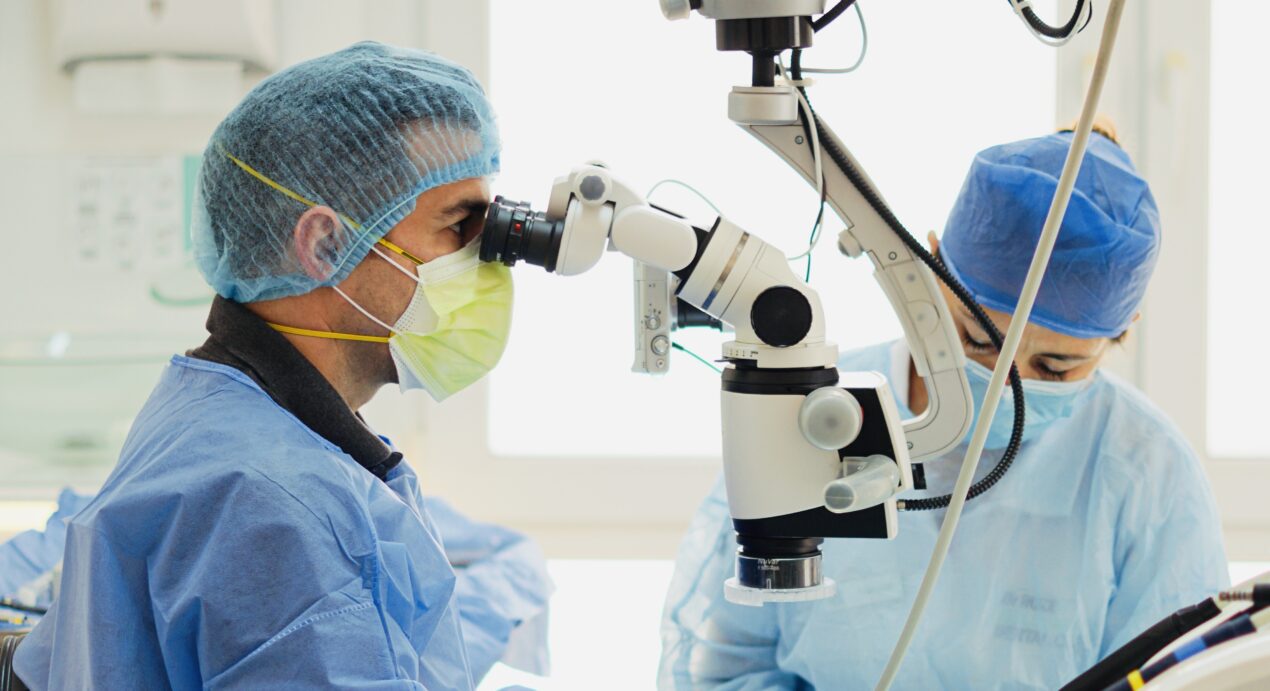 Surgeons performing an operation together.